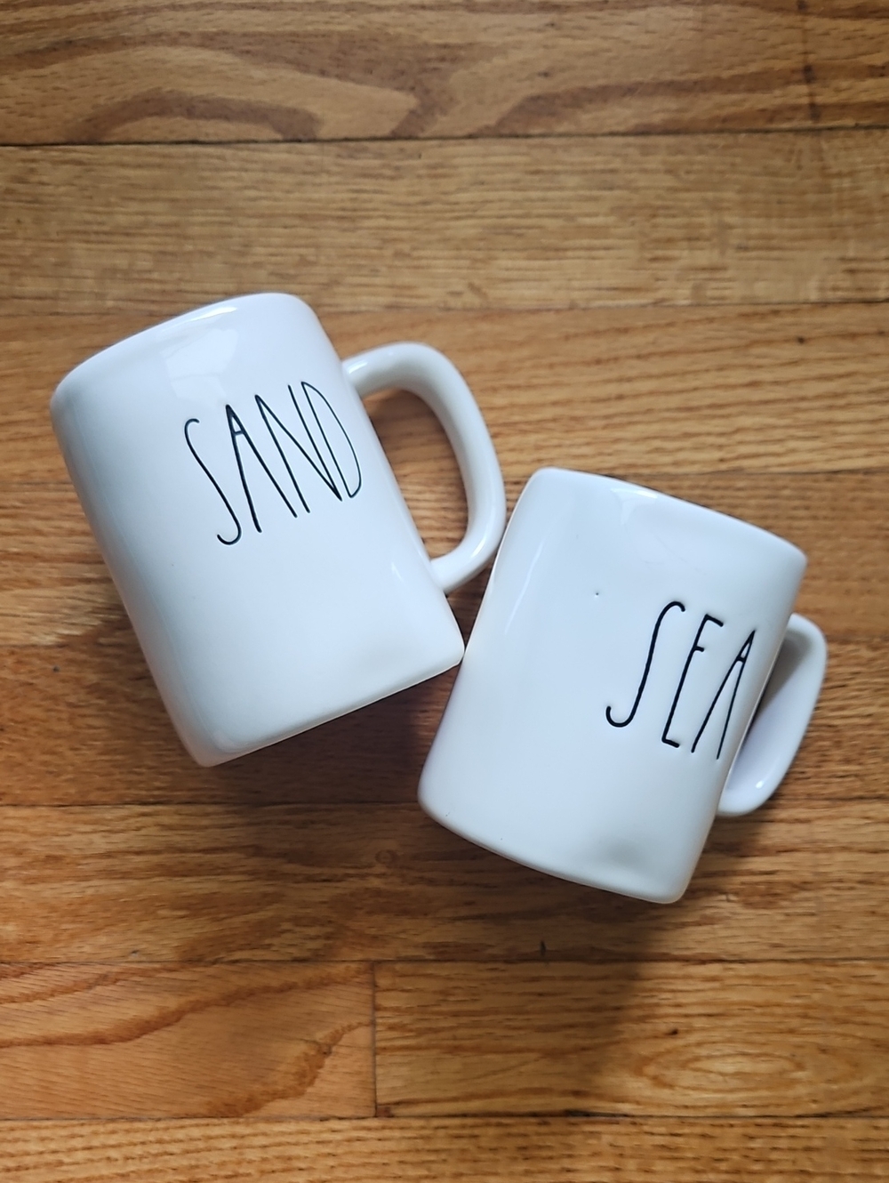 Rae Dunn White 'SAND' & 'SEA' Ceramic Mug Duo